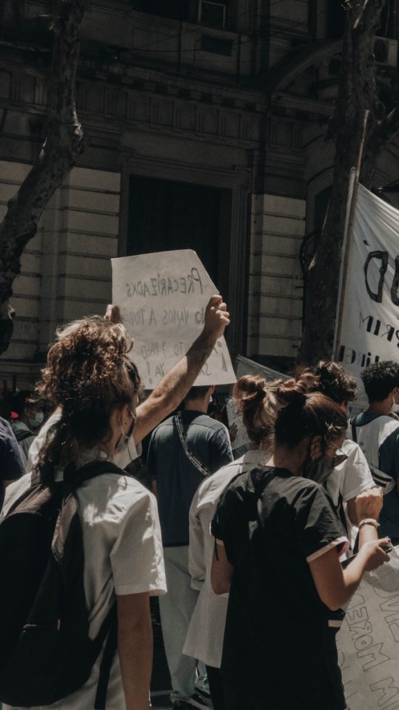 people standing near building during daytime